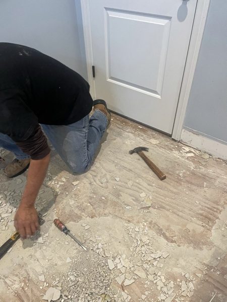 Removing the old floor by hand — Los Alamitos, 2024