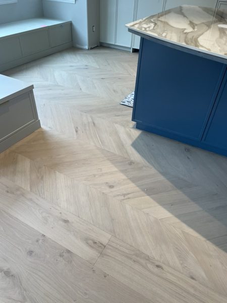 Chevron oak floor in kitchen — Manhattan Beach, 2026