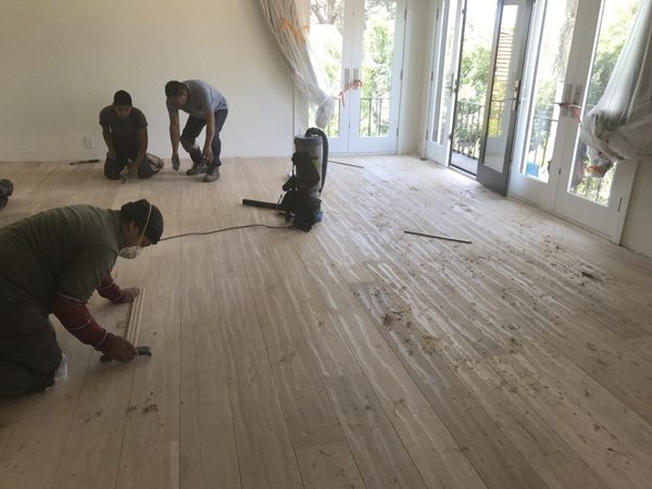 Crew installing wide planks — Santa Monica, 2017