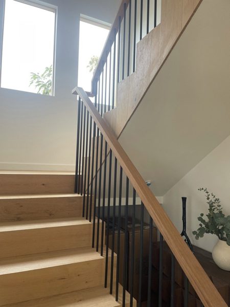 Oak stairs with metal railing — Los Angeles, 2023